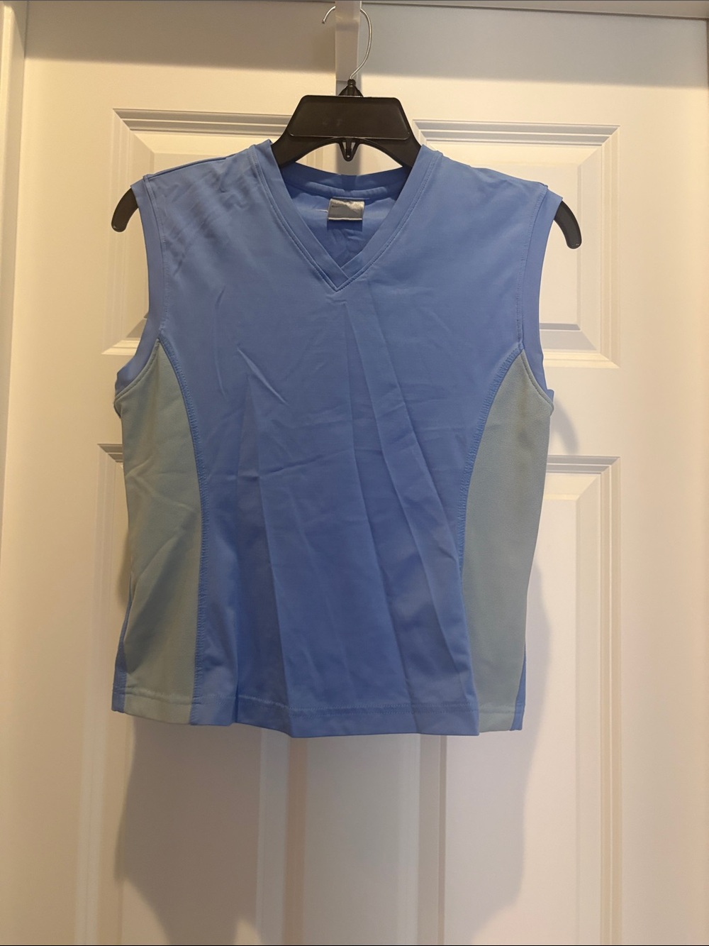 Nike Women’s Light Blue V-Neck Sleeveless Active Tank- 90% nylon, 10% spandex